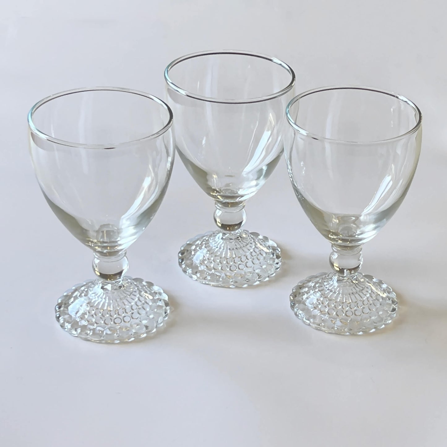 Anchor-Hocking-Clear-Bubble-Foot-Goblets.-Set of-three.