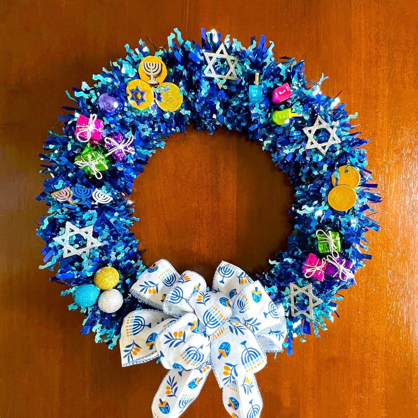 Blue-Tinsel-Chanukah-Door-Wreath-with-wooden-ornaments.