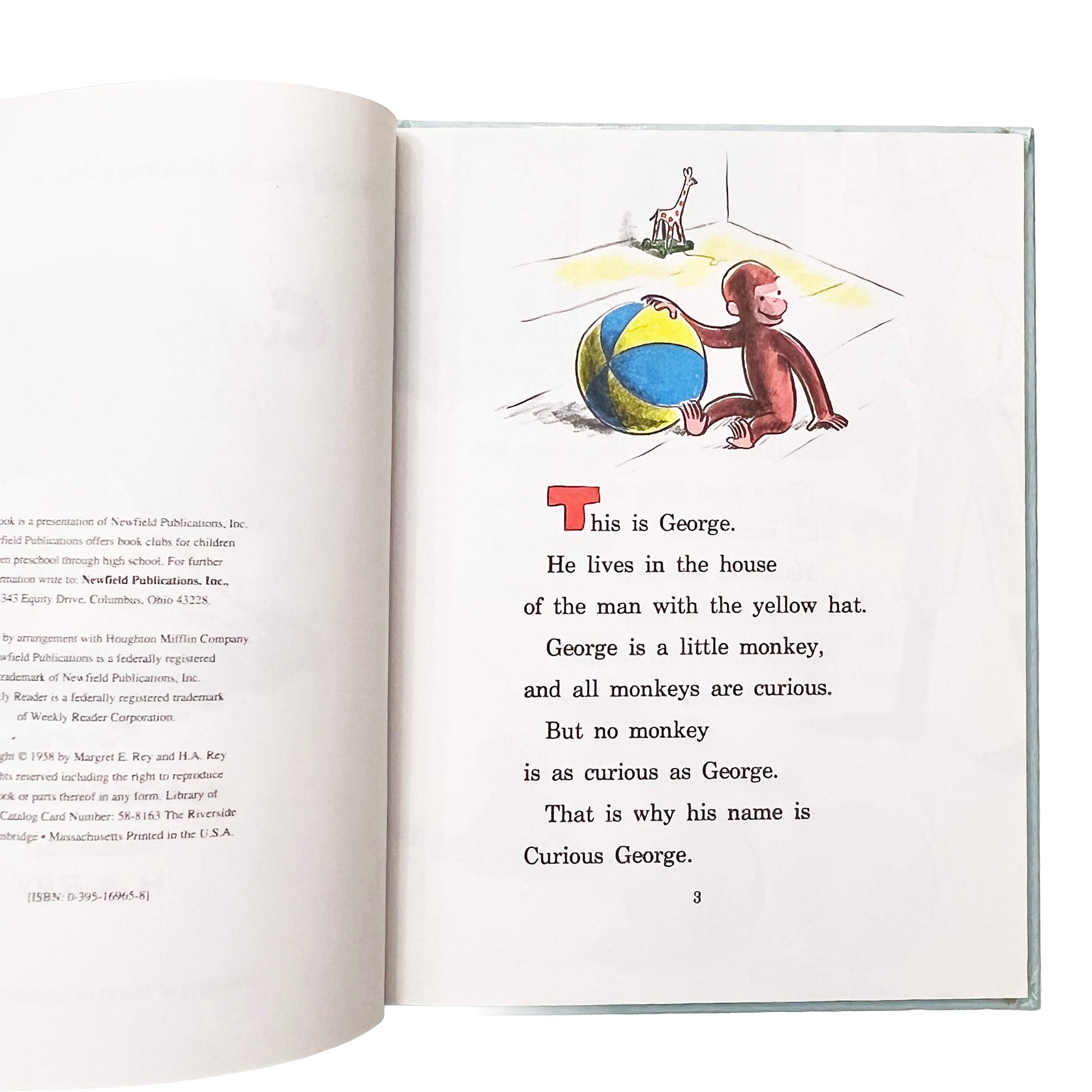 Open book with Curious George illustration and text on a white background