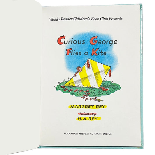 Book cover of 'Curious George Flies a Kite' with illustration of a child flying a kite.