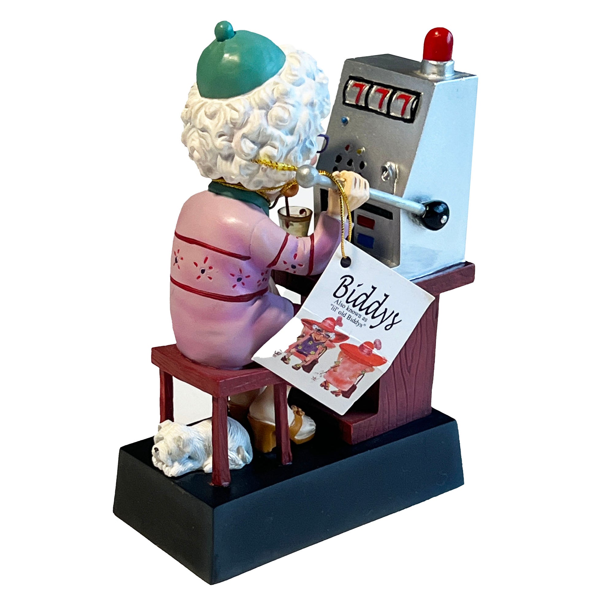 Lil-Ol-Biddys-Casino-Lady-Queen-Mother Figurine-sitting-at-the-slot-machine, showing 777.