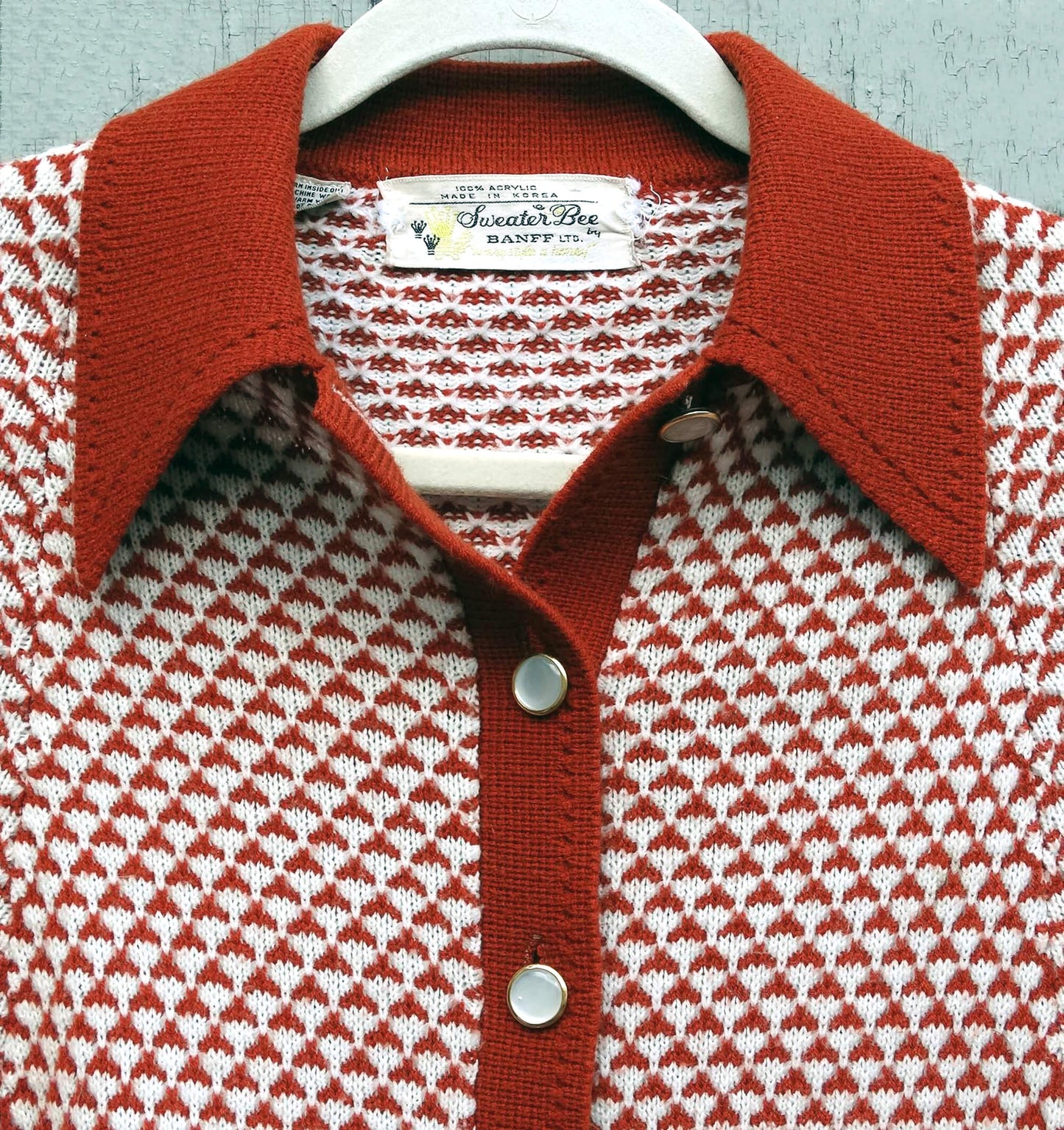 Sweater-Bee-Cape by-Banff.-Orange-and-White-Patterned.-Mother-of-Pearl-Buttons.-Fringed.-Shop-eBargainsAndDeals.com.