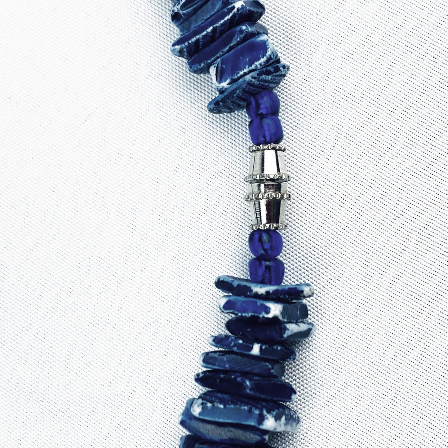 screw-clasp-on-a-puka-shell-necklace