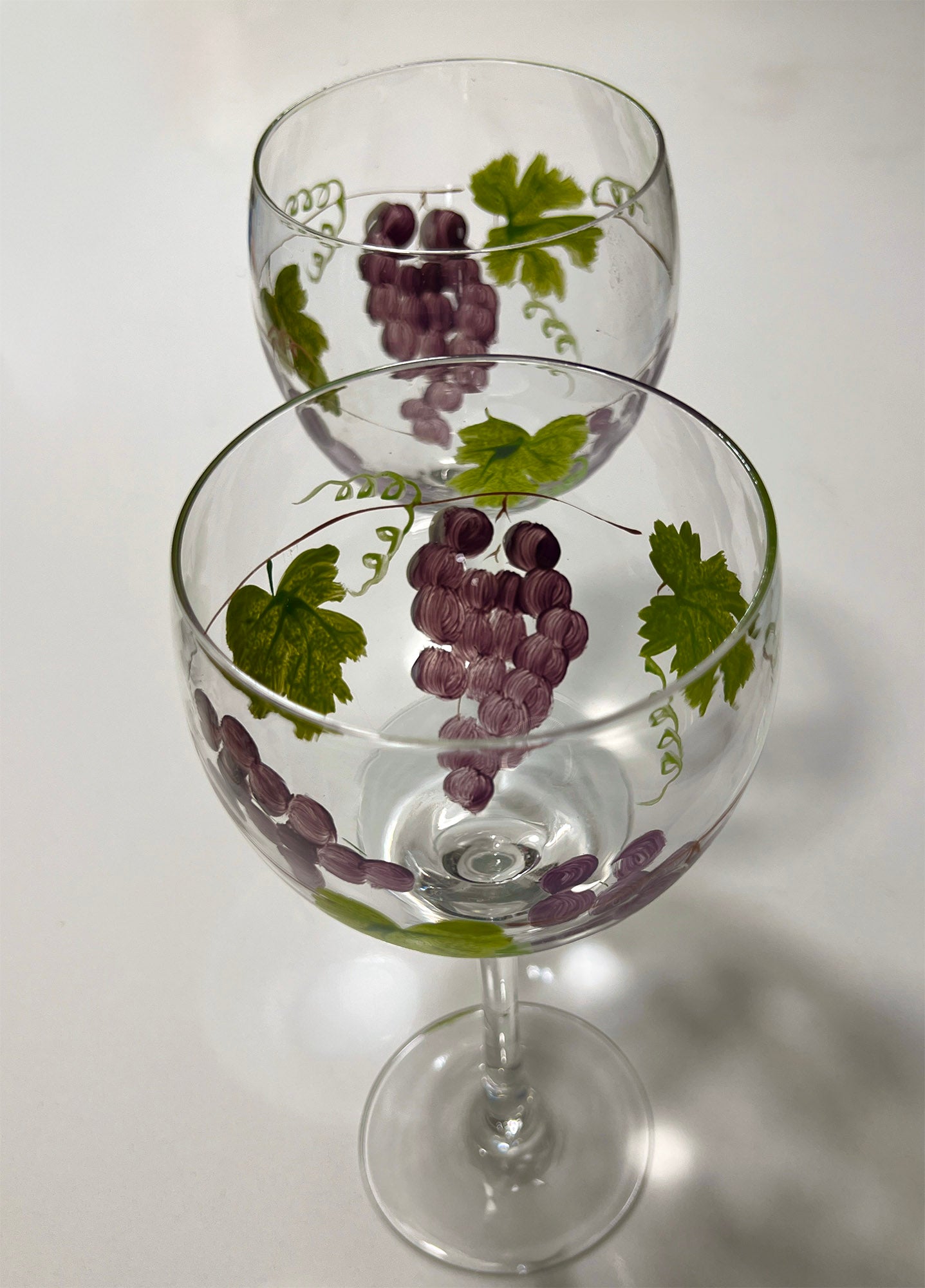 2-hand-painted-grape-and-leaf-tall-goblets.-View-from-top