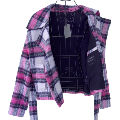 Plaid jacket with pink and navy blue, pattern on a white background, showing that tag and interior of the jacket