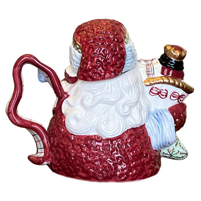 Avon-Santa-Claus-China-Teapot.-Christmas-Drinkware.-Back-view.