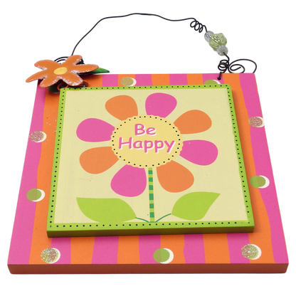 Decorative wall hanging with a colorful flower design and 'Be Happy' text on a striped background.