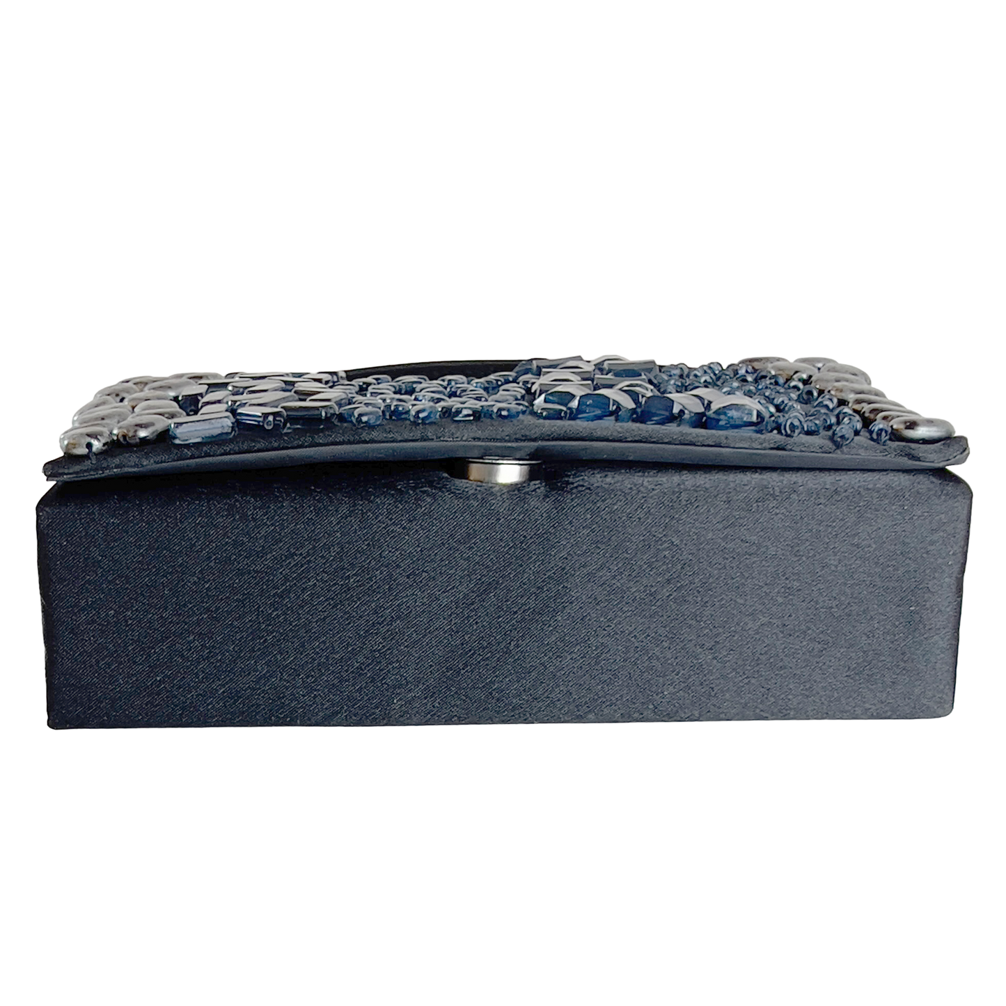 Black clutch with decorative blue stones laying flat, showing the bottom, on a white background
