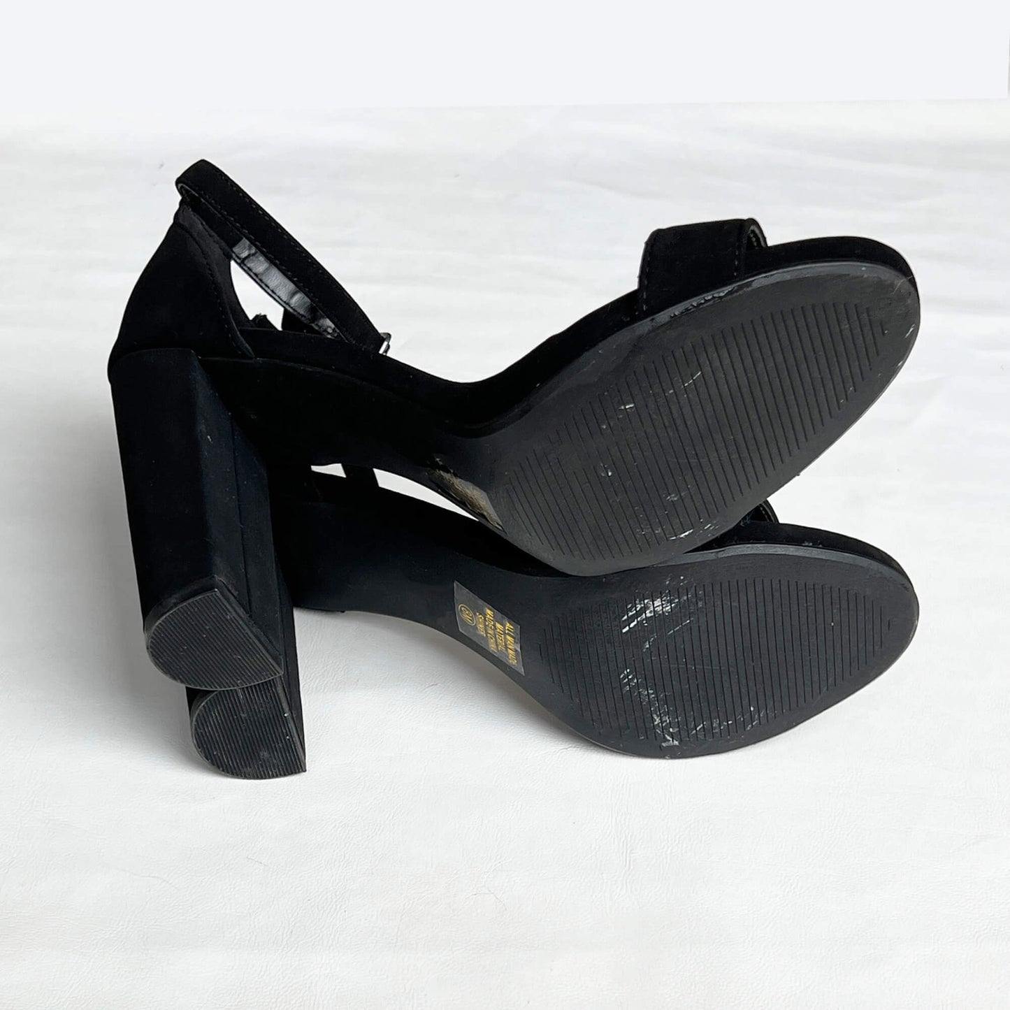 Black-Suede-Stietto-Ankle-Strap-Shoes.-Bottom-view.-