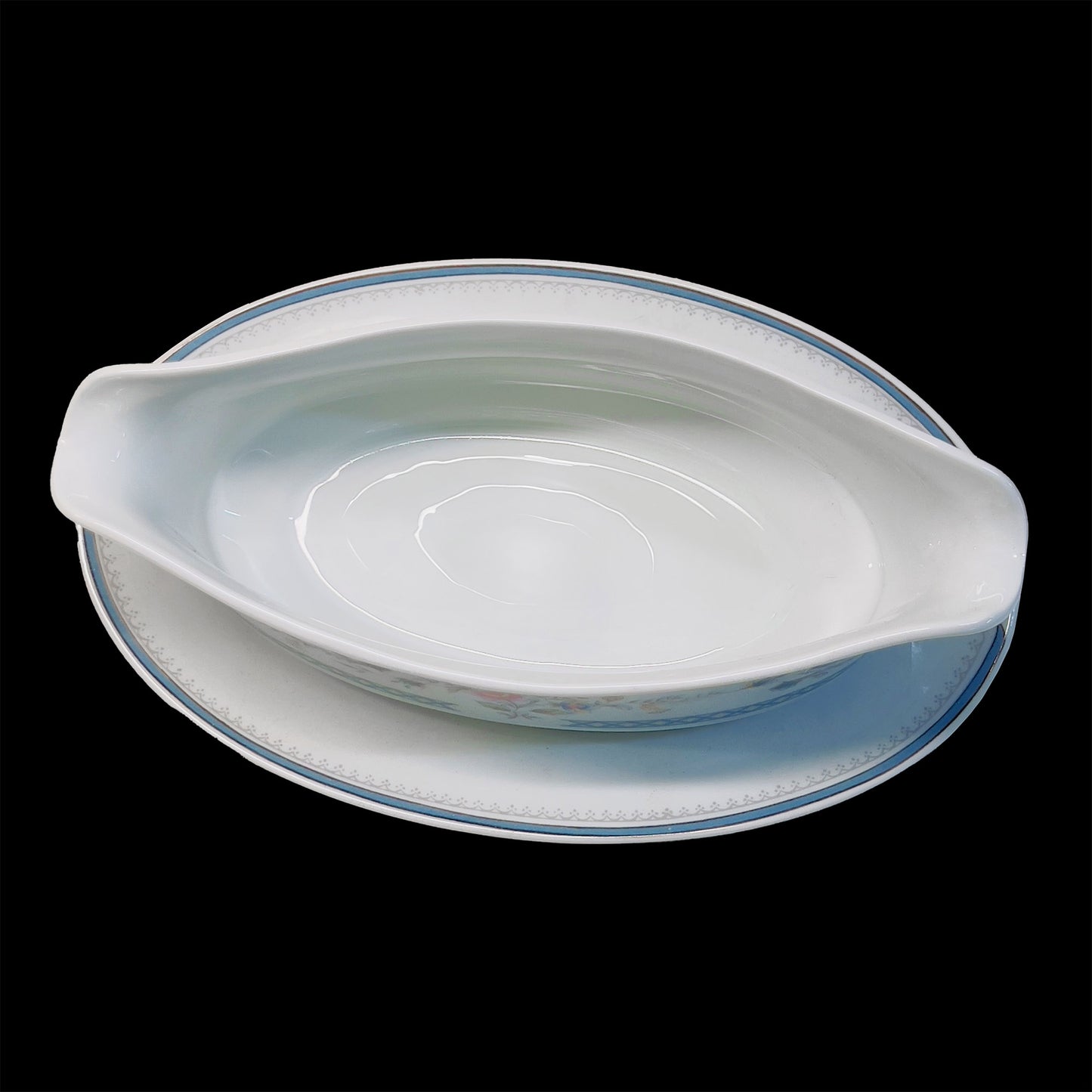 Bottom of Brookwood Stratford gravy boat showing M1012 model number and fine porcelain manufacturer mark