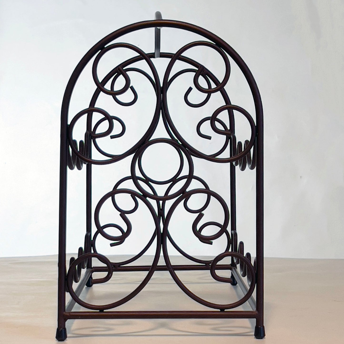 Brown-Metal-Freestanding-Decorative-Wine-Rack.-End-view.