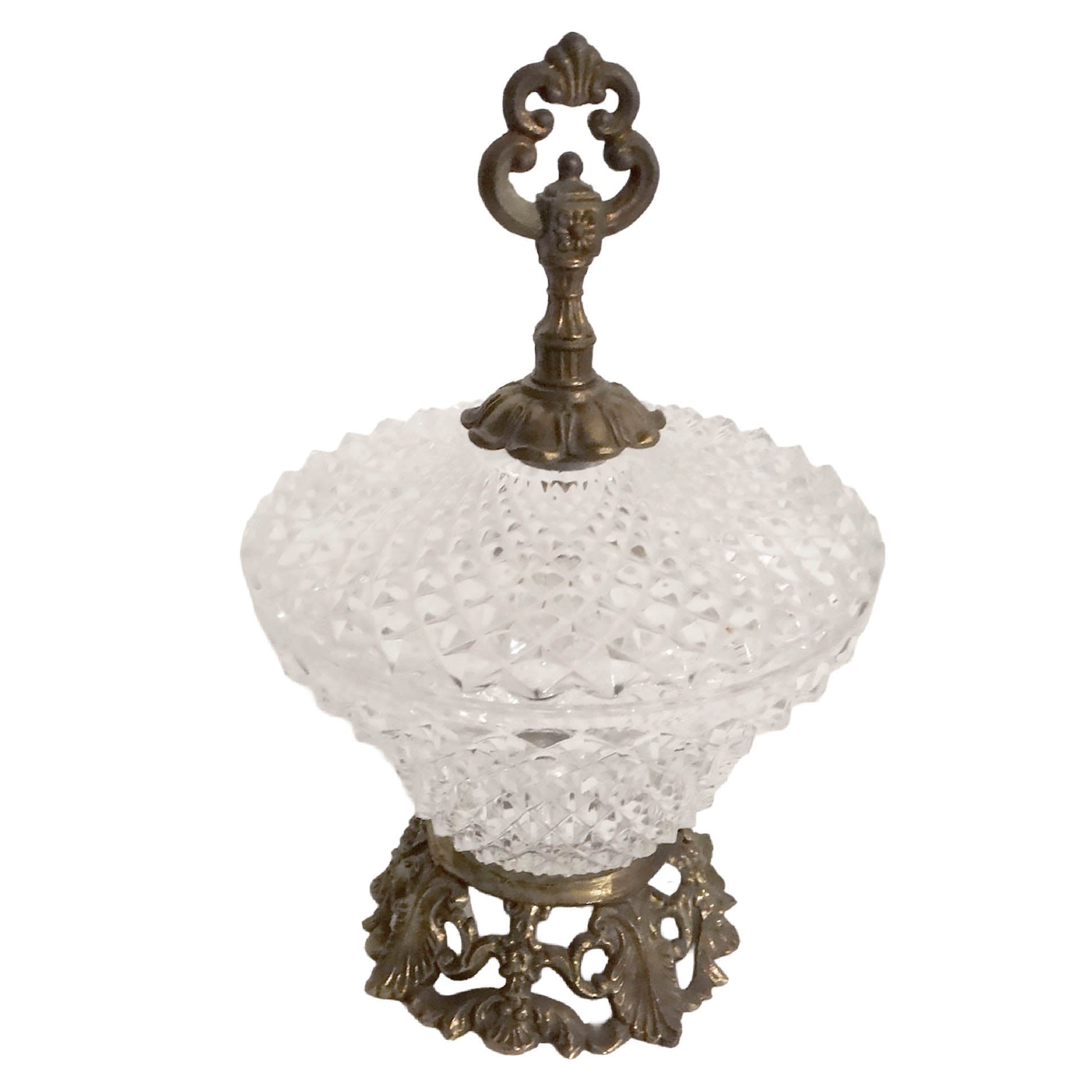 Decorative glass bowl with ornate bronze base on a white background