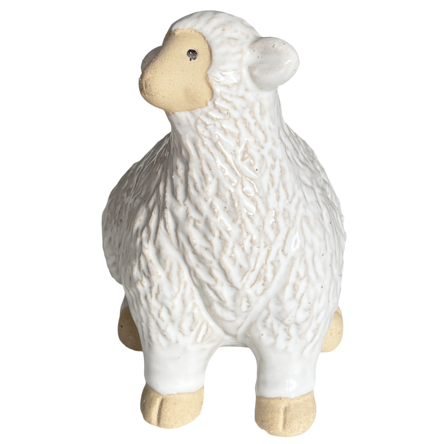 White ceramic sheep figurine on a white background