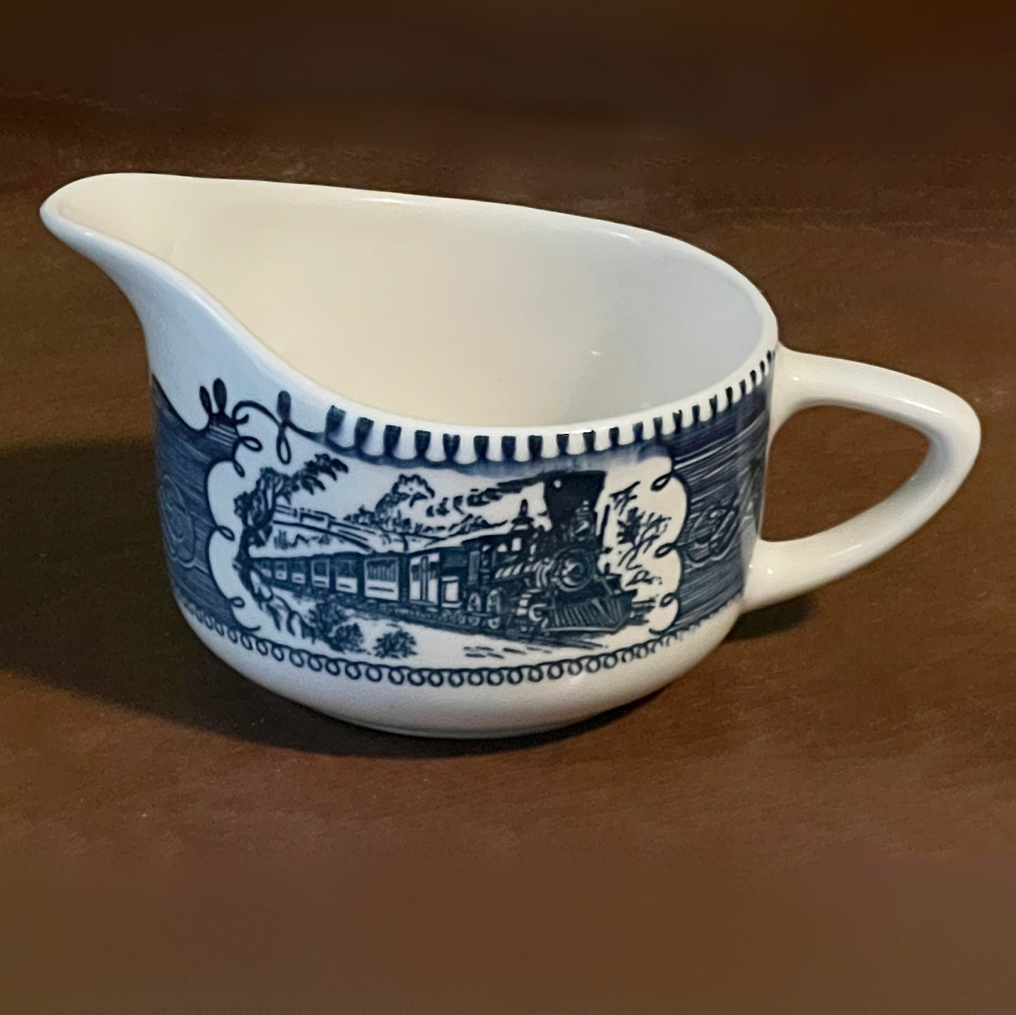 Currier-and-Ives-China-Creamer-by-Royal-China-side-2.-Shop-eBargainsAndDeals.com