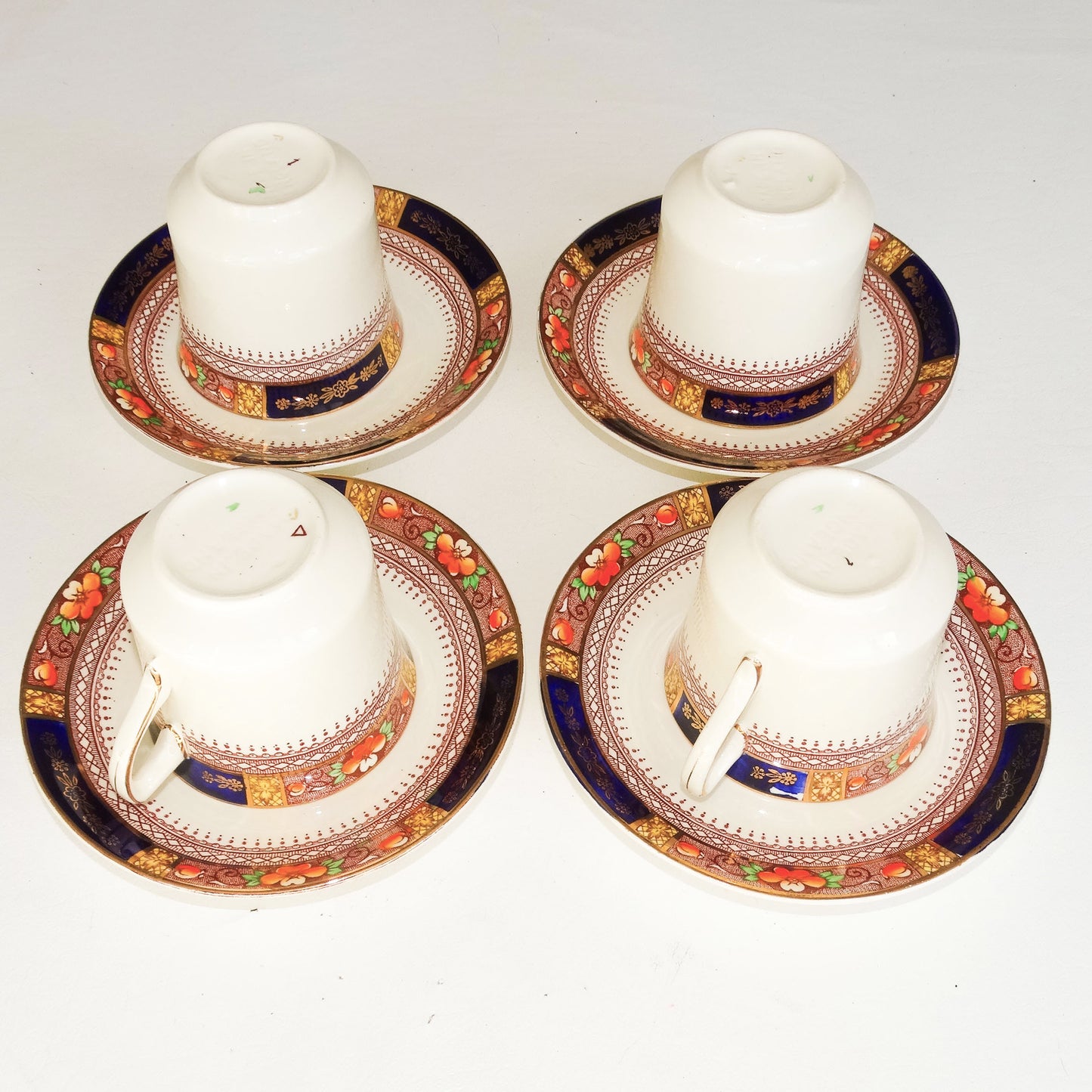 J&G-Meakin-Cobalt-Blue-and-Brown-Cups-and-Saucers. Cups-Upside-Down-View.