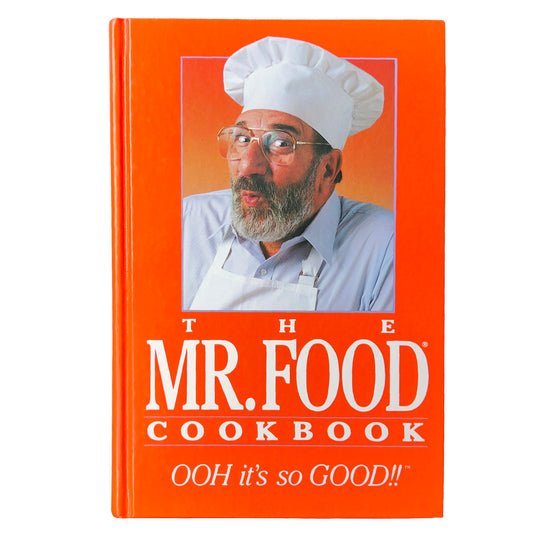 Orange cookbook titled 'The Mr. Food Cookbook' with a picture of a chef on the cover.