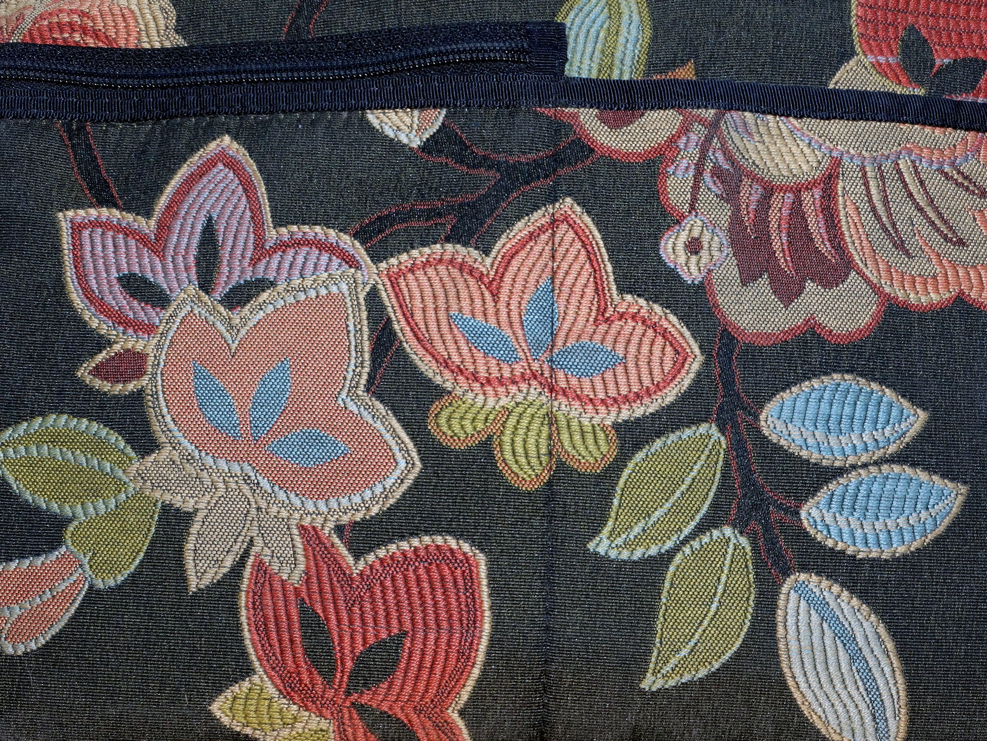 Close up view of Danny K tapestry bag with floral pattern