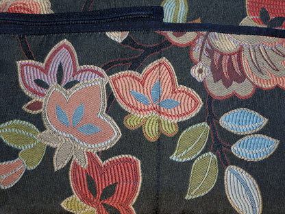 Close up view of Danny K tapestry bag with floral pattern