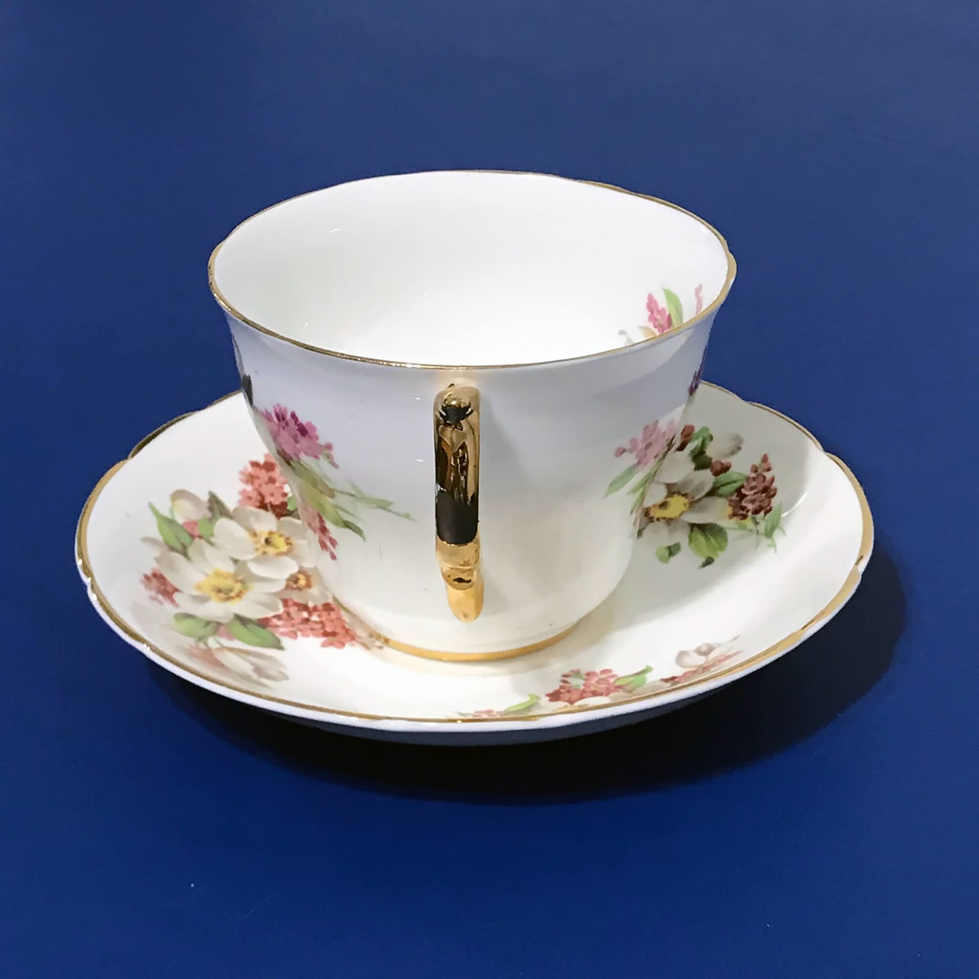 Regency-Floral-Collectible-Daffodil -Teacup-and-Saucer_side-view-_